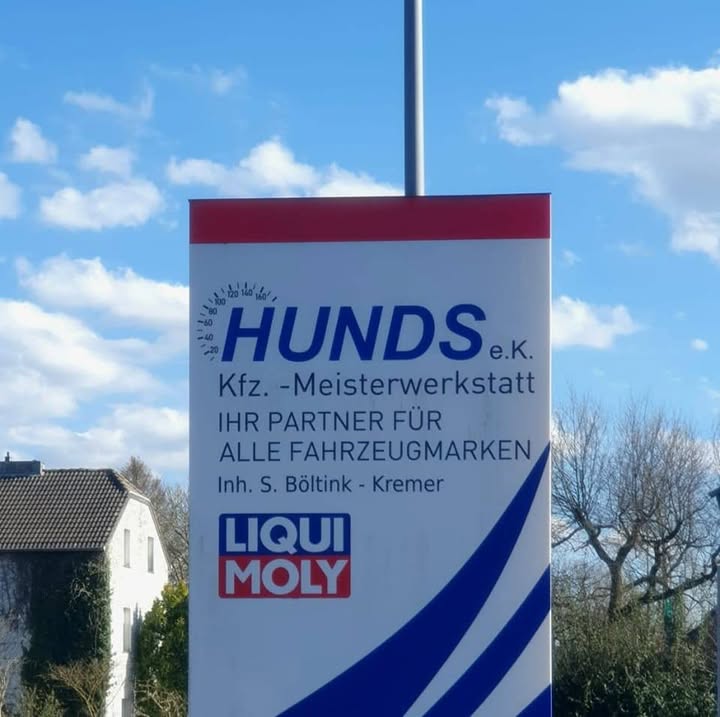 Straßenschild der KFZ-Meisterwerkstatt Hunds an der Eilendorfer Straße